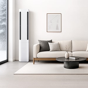 화이트톤 거실에 휘센 사계절 에어컨이 배치된 이미지.